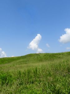 Preview wallpaper hill, grass, clouds, nature, landscape
