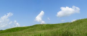 Preview wallpaper hill, grass, clouds, nature, landscape