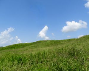 Preview wallpaper hill, grass, clouds, nature, landscape