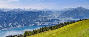 Preview wallpaper hill, grass, mountains, sea, clouds, nature