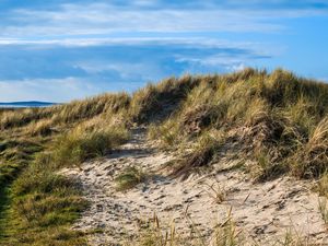 Preview wallpaper hill, grass, sand, nature