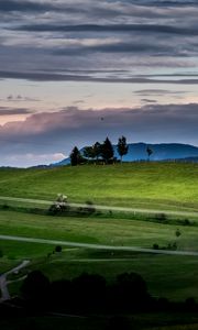 Preview wallpaper hill, grass, trees, road, sky