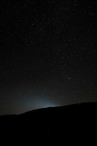 Preview wallpaper hill, light, starry sky, night, dark