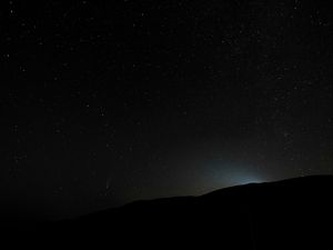 Preview wallpaper hill, light, starry sky, night, dark