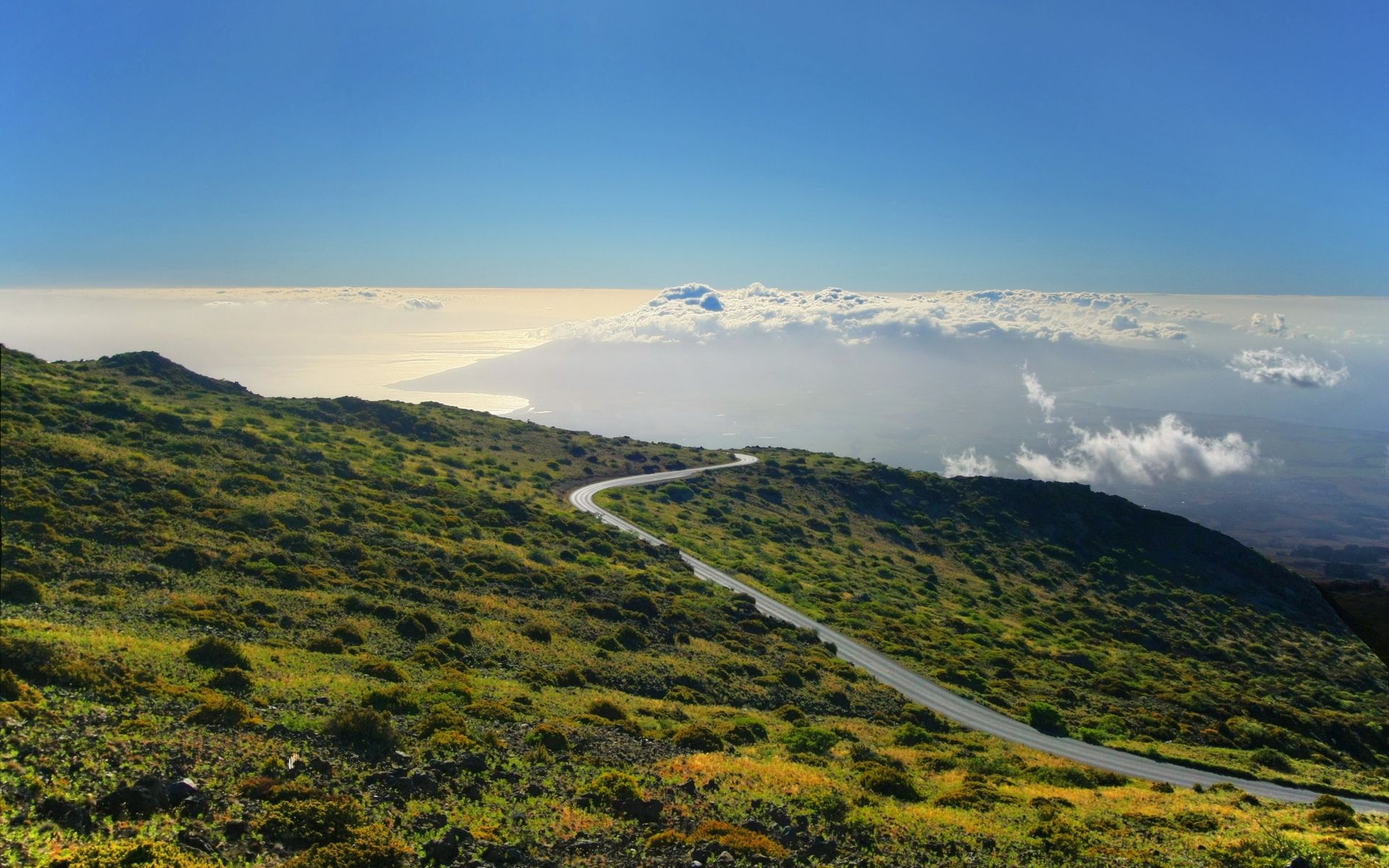 Download wallpaper 1920x1200 hill, mountain, slope, road, grass, clouds