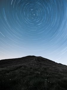 Preview wallpaper hill, mountains, starry sky, long exposure, stars, motion