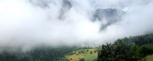 Preview wallpaper hill, mountains, trees, fog, clouds, landscape