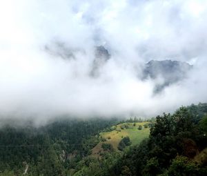 Preview wallpaper hill, mountains, trees, fog, clouds, landscape