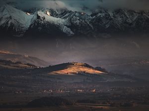 Preview wallpaper hill, mountains, trees, snowy