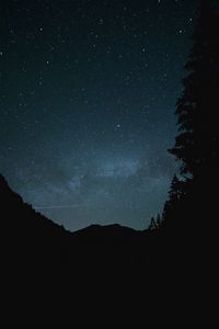 Preview wallpaper hill, night, starry sky, stars, silhouette