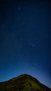 Preview wallpaper hill, night, starry sky, stars, relief