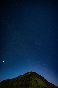 Preview wallpaper hill, night, starry sky, stars, relief