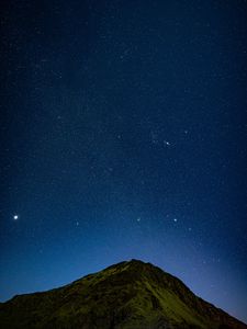 Preview wallpaper hill, night, starry sky, stars, relief