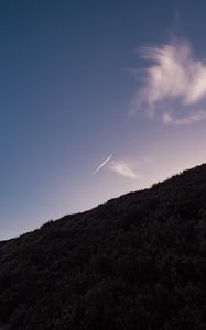 Preview wallpaper hill, plane, trail, smoke, sky
