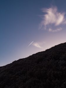 Preview wallpaper hill, plane, trail, smoke, sky