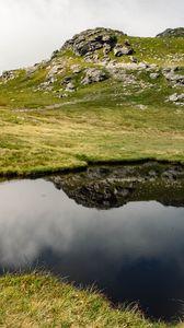 Preview wallpaper hill, relief, water, reflection, nature, landscape