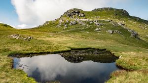 Preview wallpaper hill, relief, water, reflection, nature, landscape