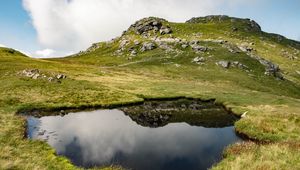 Preview wallpaper hill, relief, water, reflection, nature, landscape