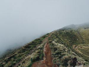 Preview wallpaper hill, ridge, fog, path, grass, slope