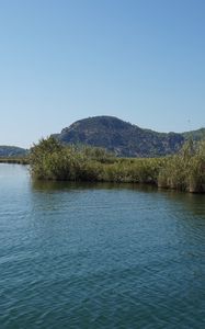 Preview wallpaper hill, river, grass, nature, landscape