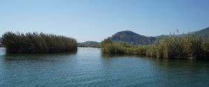 Preview wallpaper hill, river, grass, nature, landscape