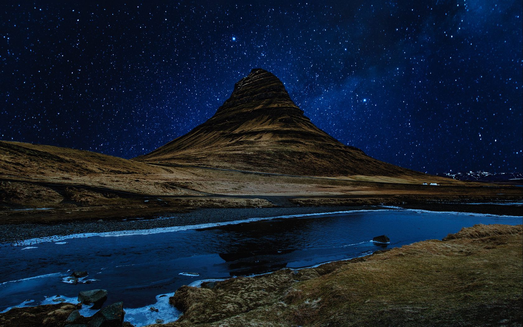 Download wallpaper 1680x1050 hill, river, starry sky, night widescreen