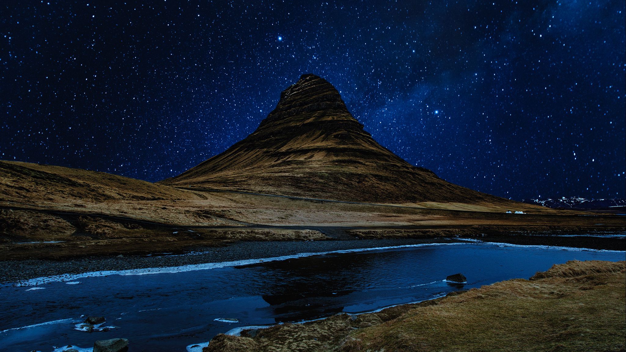 Download wallpaper 2048x1152 hill, river, starry sky, night ultrawide