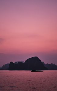 Preview wallpaper hill, rocks, sea, evening, pink