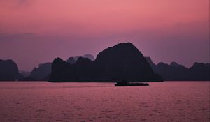 Preview wallpaper hill, rocks, sea, evening, pink