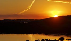 Preview wallpaper hill, sea, stones, sunset, nature