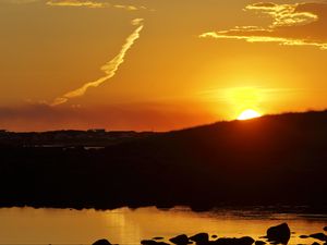 Preview wallpaper hill, sea, stones, sunset, nature