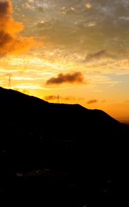 Preview wallpaper hill, silhouette, evening, sky, clouds