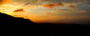 Preview wallpaper hill, silhouette, evening, sky, clouds