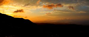 Preview wallpaper hill, silhouette, evening, sky, clouds