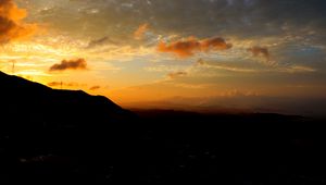 Preview wallpaper hill, silhouette, evening, sky, clouds