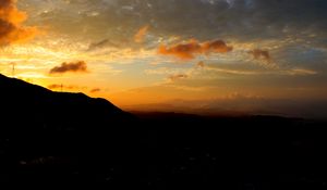 Preview wallpaper hill, silhouette, evening, sky, clouds