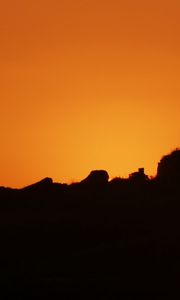 Preview wallpaper hill, silhouette, sky, sunset, evening
