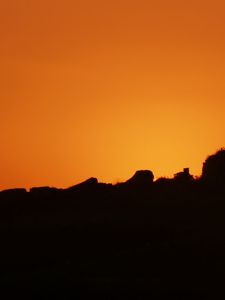 Preview wallpaper hill, silhouette, sky, sunset, evening