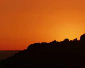Preview wallpaper hill, silhouette, sky, sunset, evening