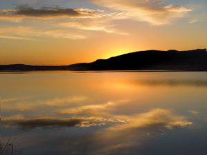 Preview wallpaper hill, silhouette, sunset, water, reflection