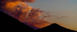 Preview wallpaper hill, silhouette, sunset, sky, clouds