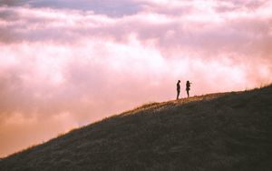 Preview wallpaper hill, silhouettes, clouds