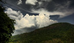 Preview wallpaper hill, sky, clouds, greenery, landscape