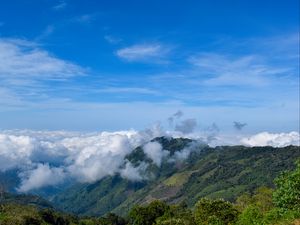 Preview wallpaper hill, slope, clouds, sky