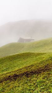 Preview wallpaper hill, slope, grass, house, fog