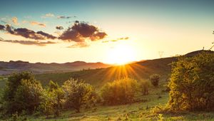 Preview wallpaper hill, slope, rays, grass, sun