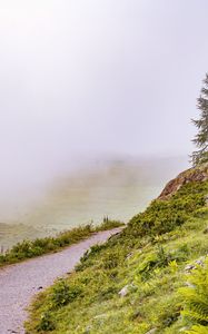 Preview wallpaper hill, slope, road, grass, nature