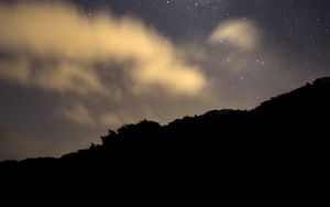 Preview wallpaper hill, stars, starry sky, clouds, night