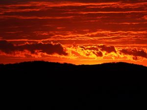 Preview wallpaper hill, sunset, clouds, sky, nature