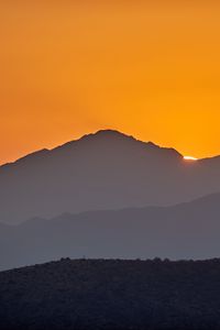 Preview wallpaper hill, sunset, sky, silhouette